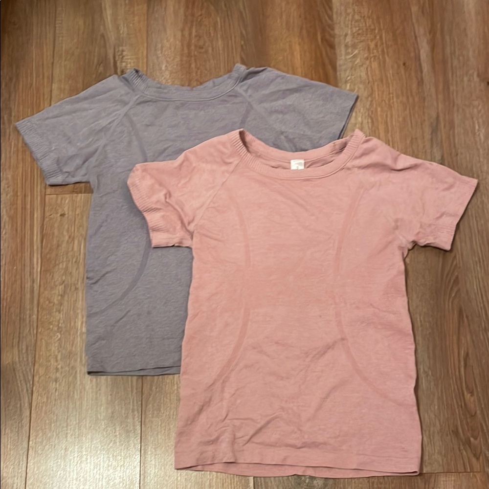 Two women’s athletic shirts